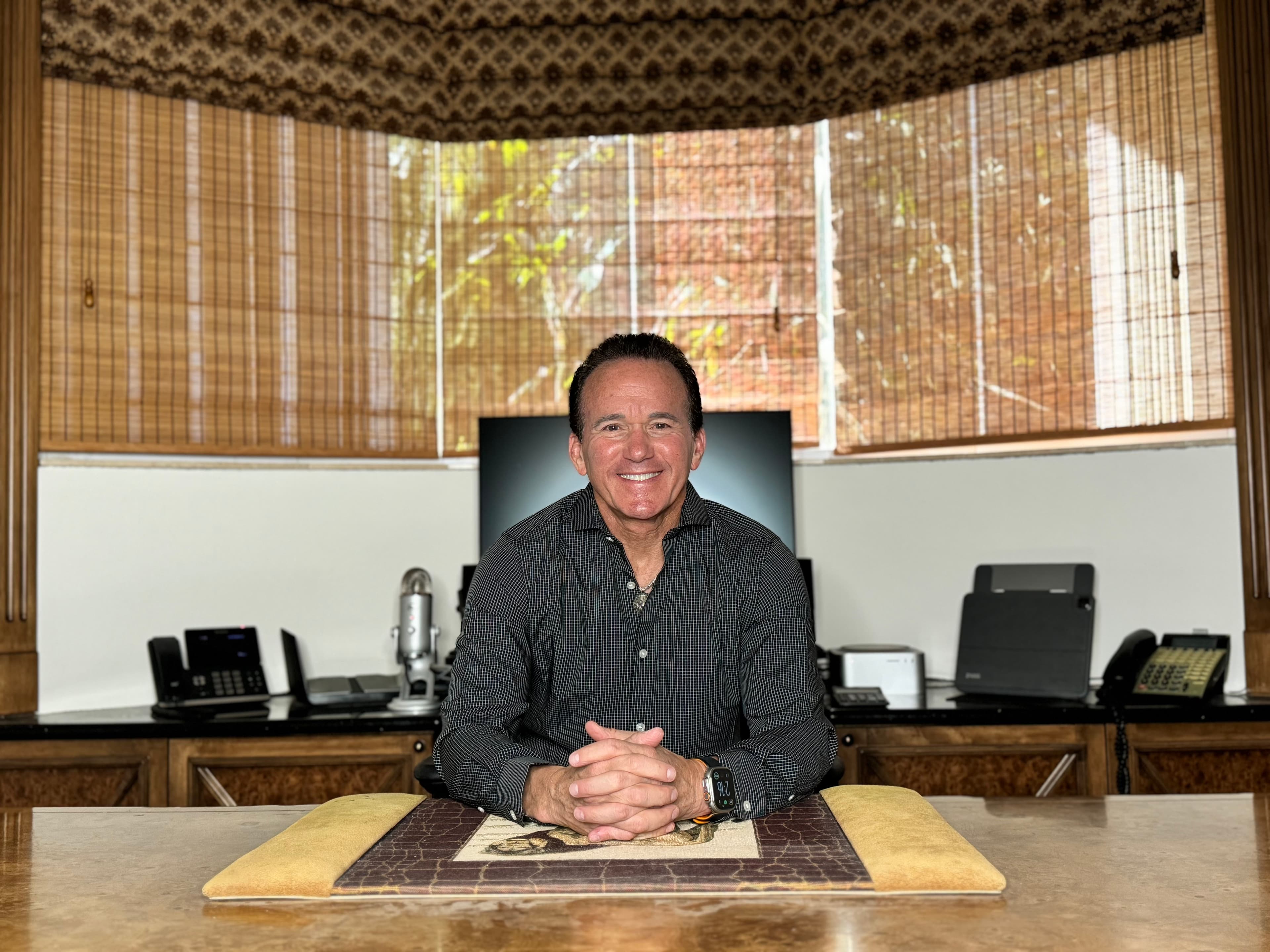 larry sitting in a chair